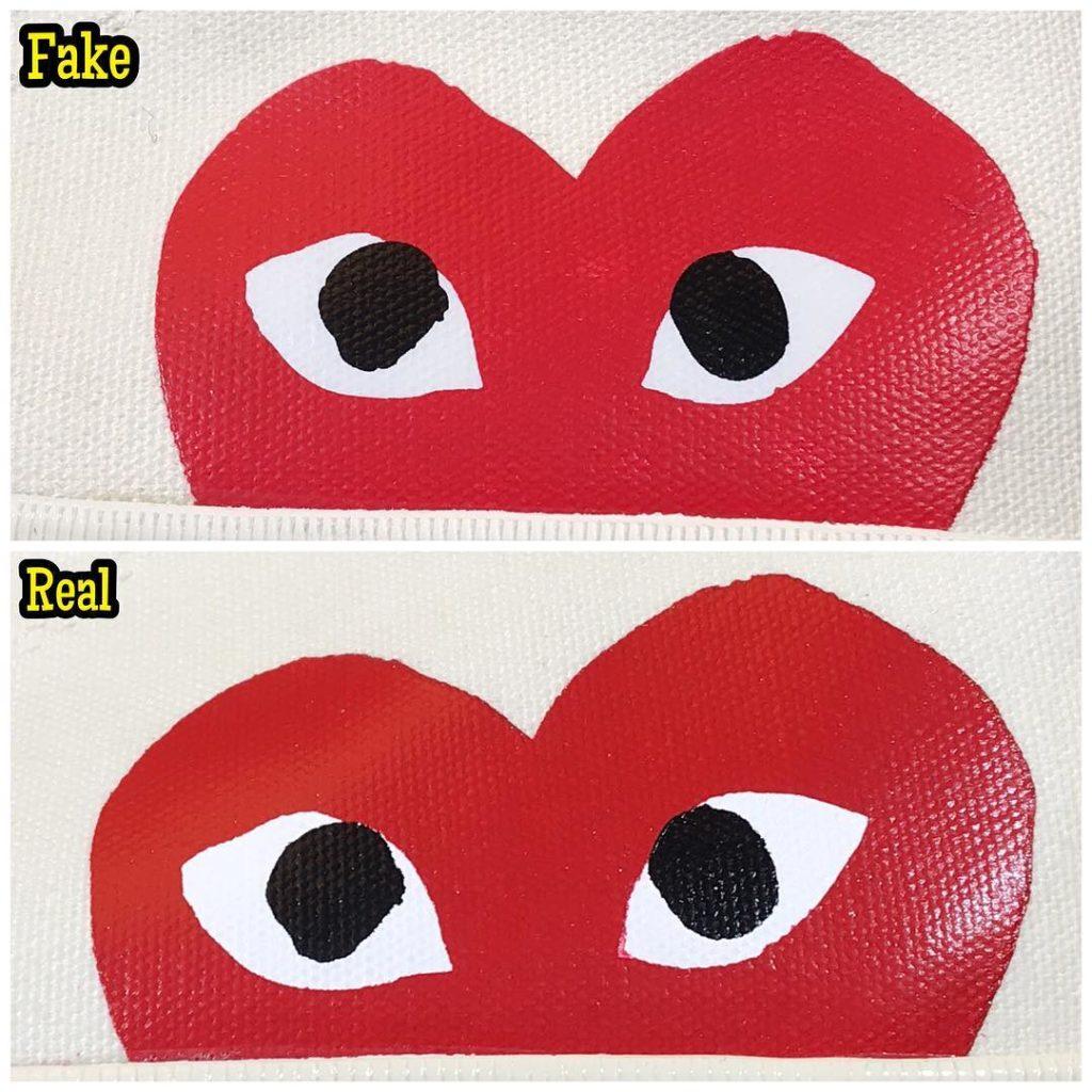 converse cdg white real fake logo